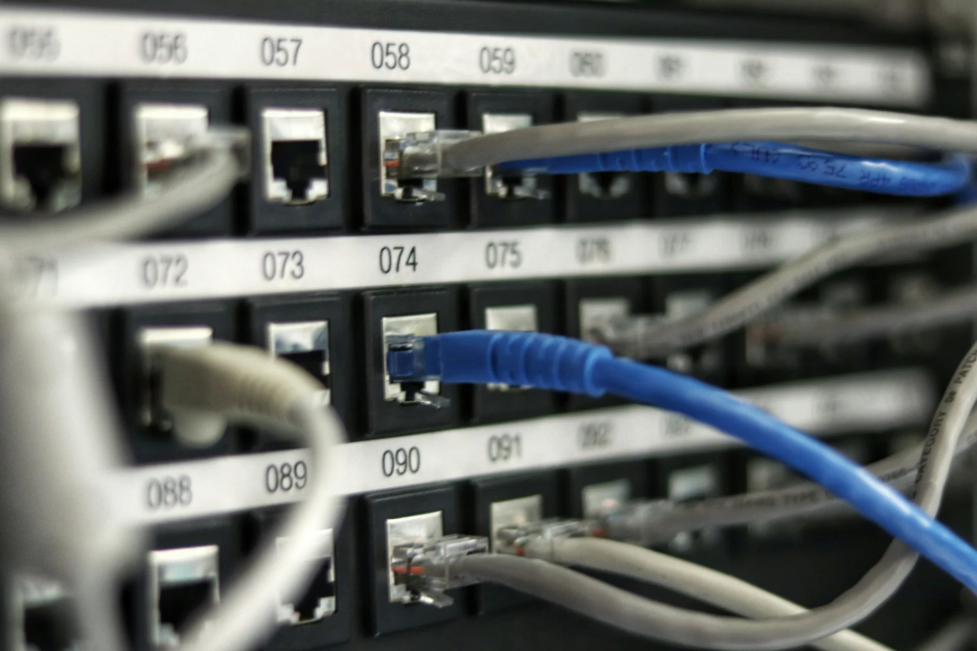 Copper patch panel with cables routed to numbered ports