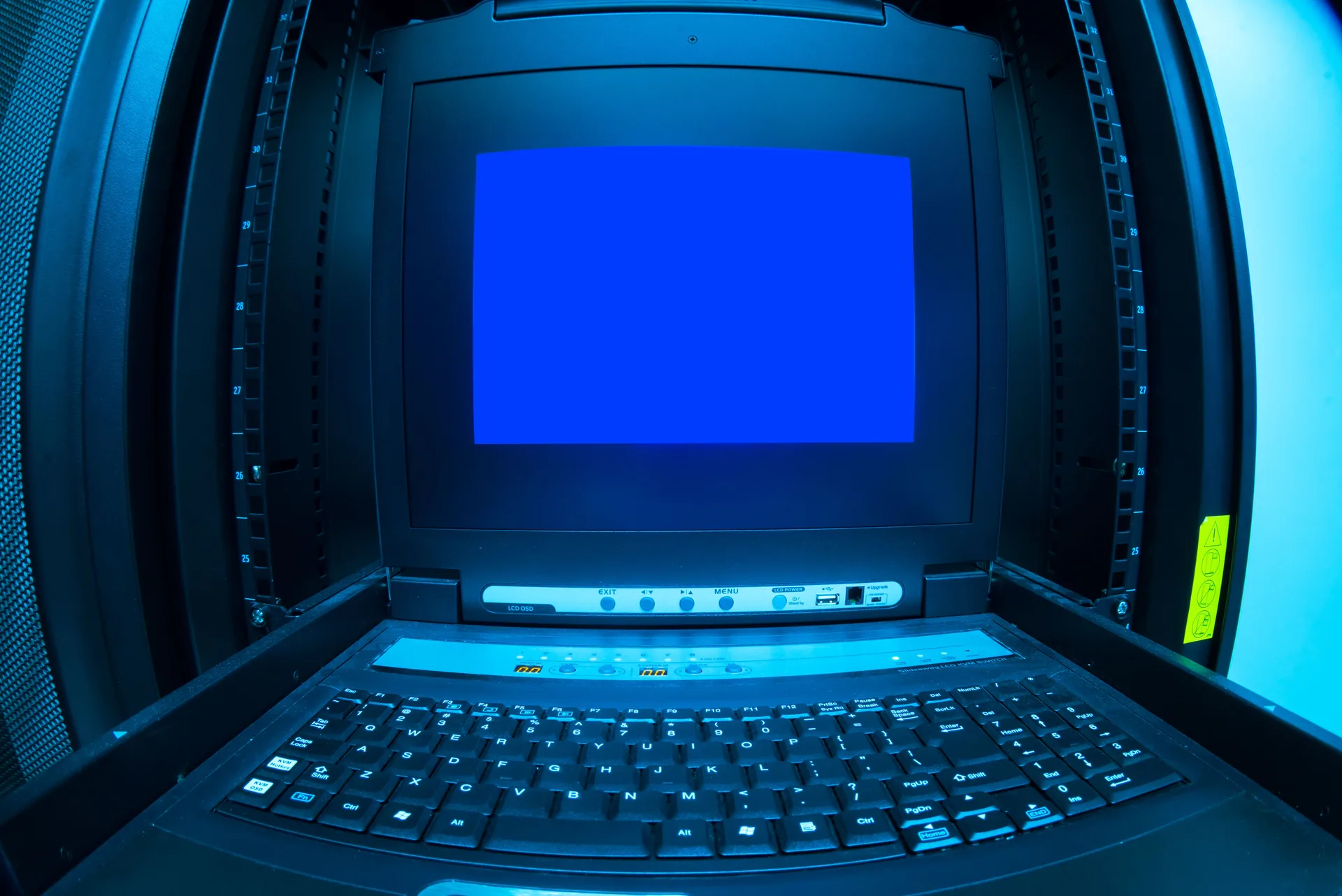KVM console and keyboard mounted in a server rack